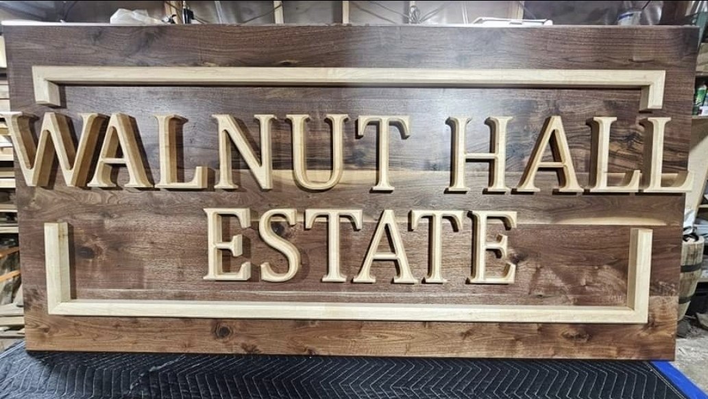Finished Walnut Hall Estate dimensional sign in the shop.